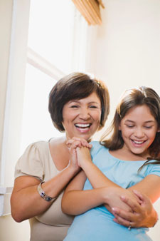 Mom and daughter laughing