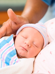 Swaddled infant, sleeping