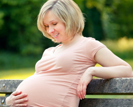 Pregnant Mom on Park Bench