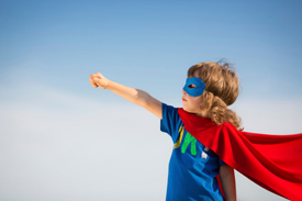 Kid in a super hero costume