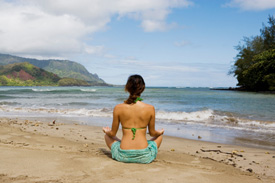 Woman sitting on beach