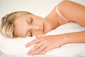 woman sleeping on soft pillow