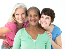 Three women smiling