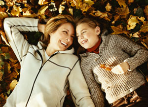 Mom and daughter enjoying fall day