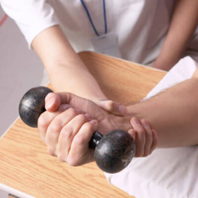 Man doing physiotherapy with weight