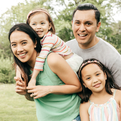 Smiling family of four
