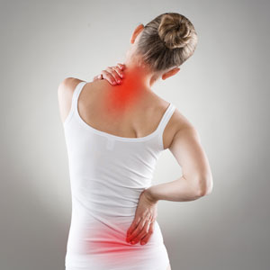 woman in a white shirt with neck and back pain