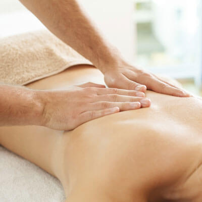 Massaging  woman back