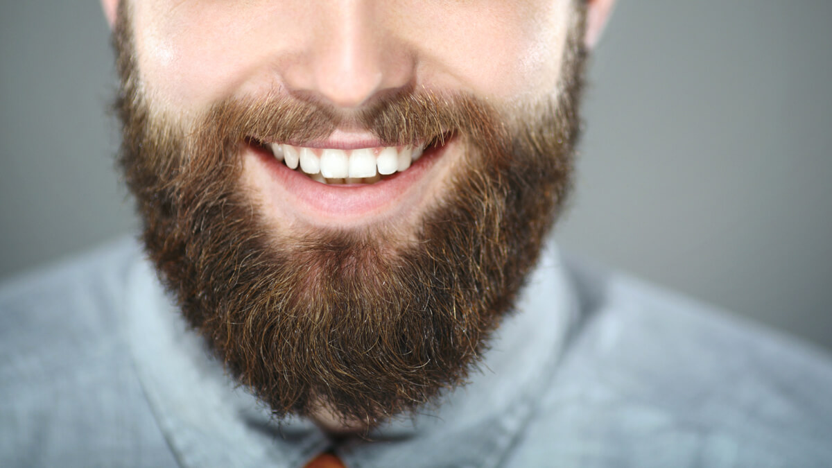 bearded man smiling