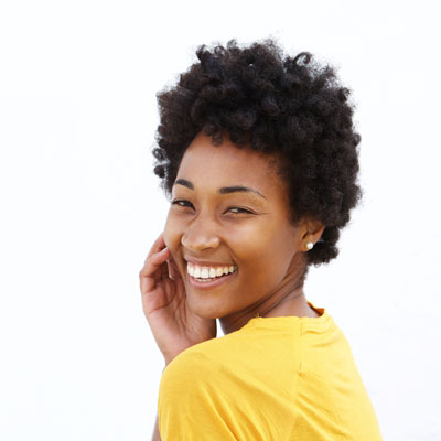 Woman with dark skin and beautiful smile