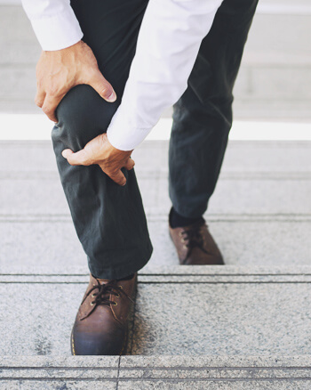 Person with knee pain