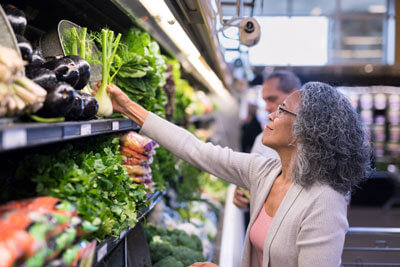 woman buying fresh fennel