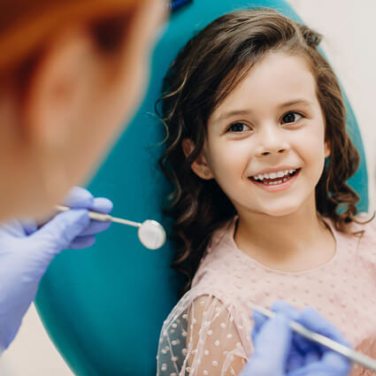 child in dental chair
