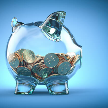 piggy bank half full of coins