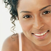 Woman with dark hair and beautiful smile