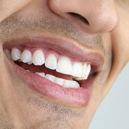 Close up view of smiling man