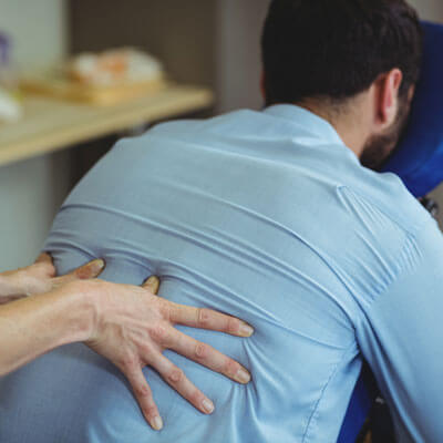 Male patient receiving a massage