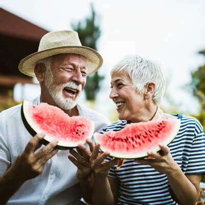 enjoying watermelon