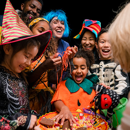 Children grabbing candy