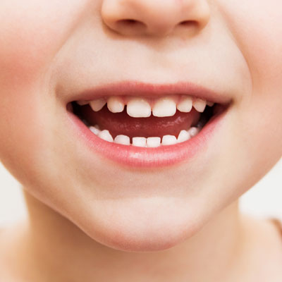 closeup of little kid smiling