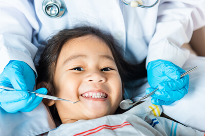 Happy child in dental chair