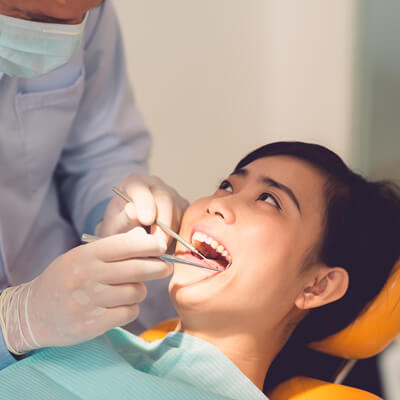 Woman getting dental checkup