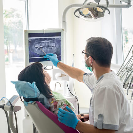 dentist pointing to xray