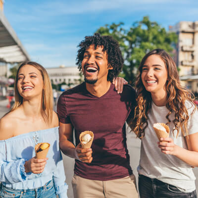 eating ice cream and laughing