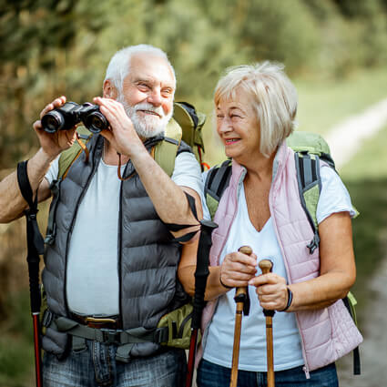 Older couple hiking outdoors