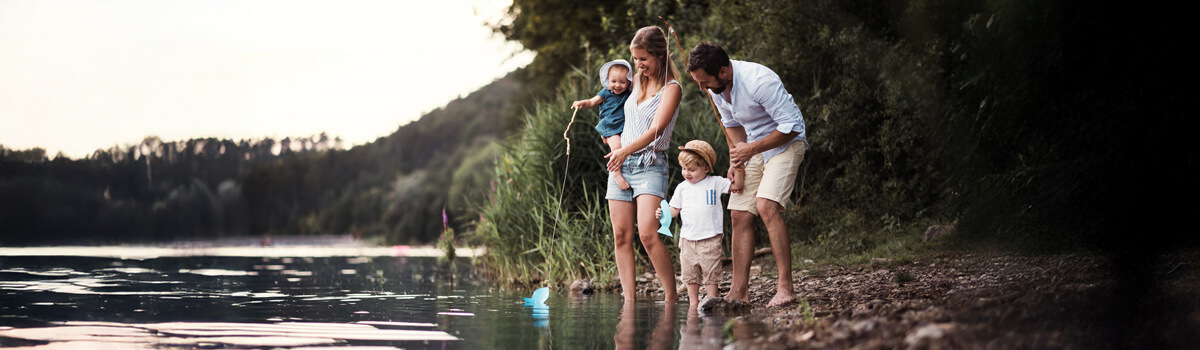 Family fishing at a lake