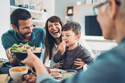 Happy family eating