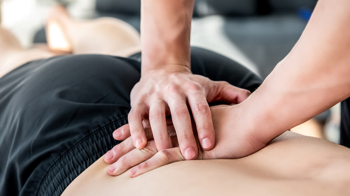 Man getting back adjustment