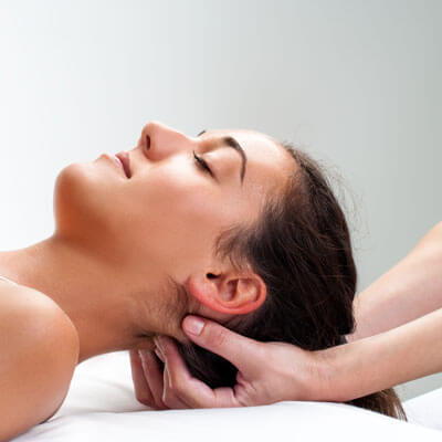 Woman getting neck massage