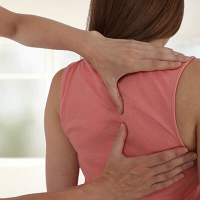 Woman being adjusted