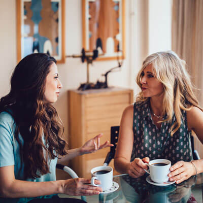 Ladies talking over coffee