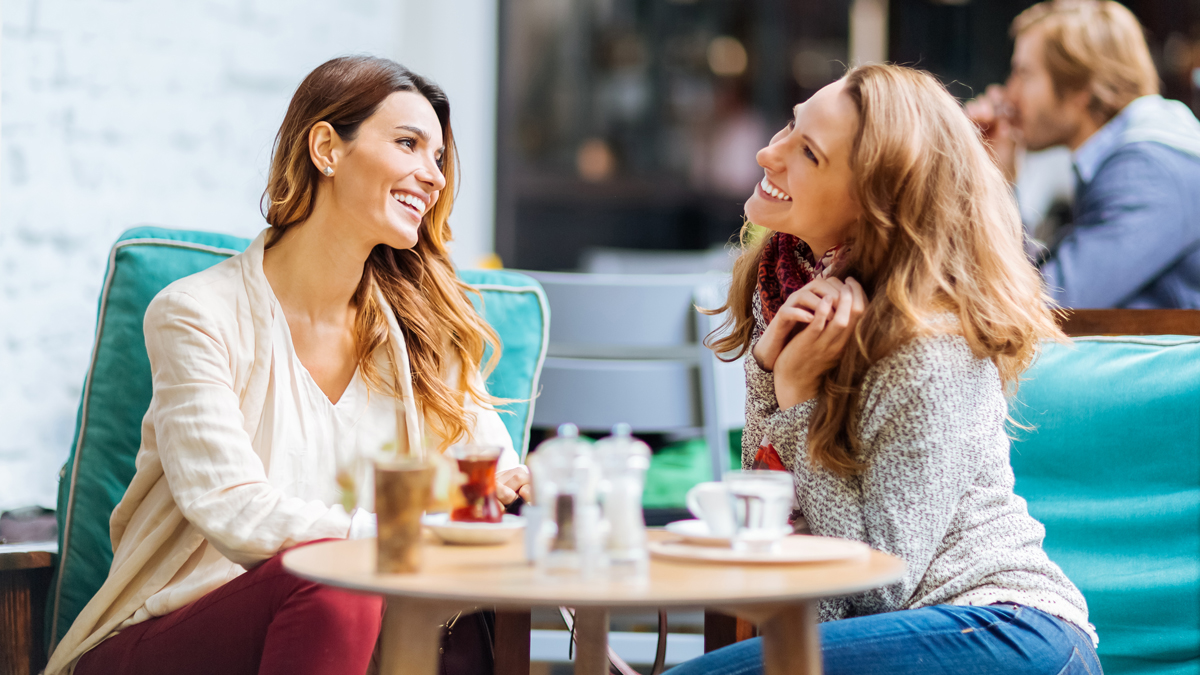 ladies laughing having tea