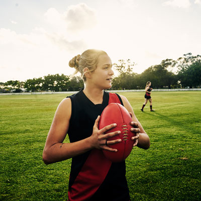 Woman playing rugby