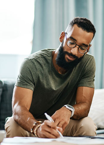 Man filling out paperwork