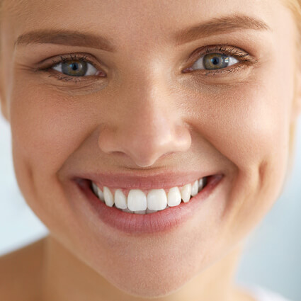 woman smiling with beautiful white teeth