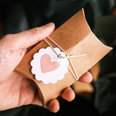 Man holding gift card box