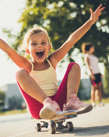 girl riding on skateboard