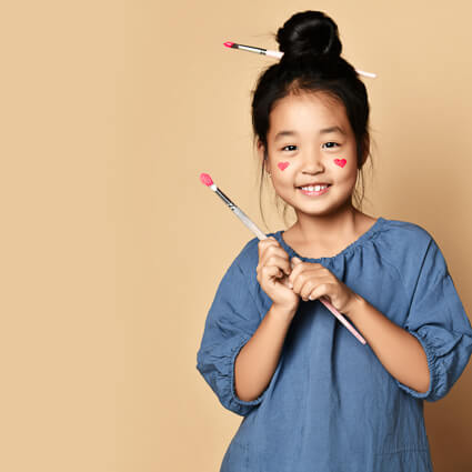 Girl with paintbrush
