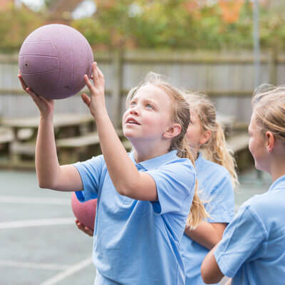 Girls playing basketball