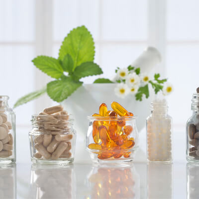 Jars with supplements on table