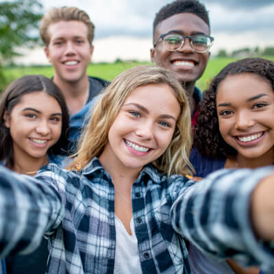 group of teens selfie