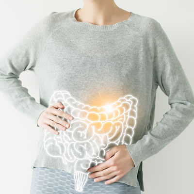 gut health drawing overlay on woman