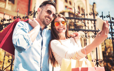 happy couple taking selfie