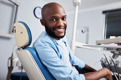 Man smiling in dental chair