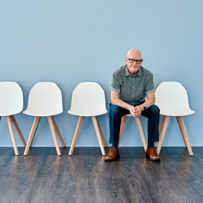 happy man in waiting room