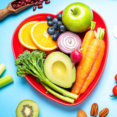 Healthy food in a heart-shaped bowl